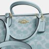 Bolso tipo cartera Rowan en Signature Canvas