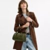 Bolso tipo cartera Rowan en Signature Canvas