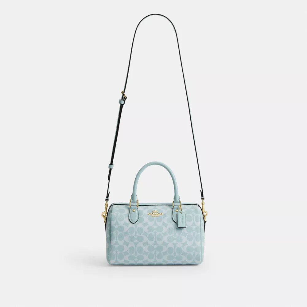 Bolso tipo cartera Rowan en Signature Canvas