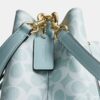 Bolso tipo cubeta Rowan en Signature Canvas