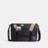 Bolso tipo mensajero Hitch en Signature Canvas con parches