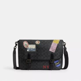Bolso tipo mensajero Hitch en Signature Canvas con parches