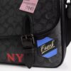 Bolso tipo mensajero Hitch en Signature Canvas con parches