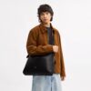 Bolso tipo mensajero Mott 38