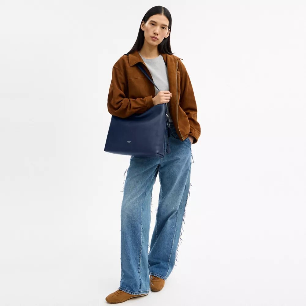 Bolso tipo mensajero Mott 38