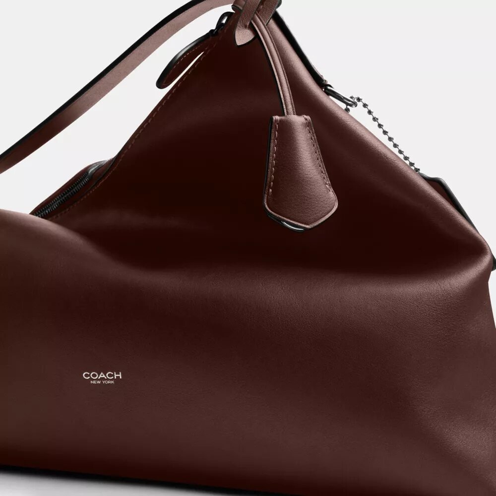 Bolso tipo mensajero Mott 38