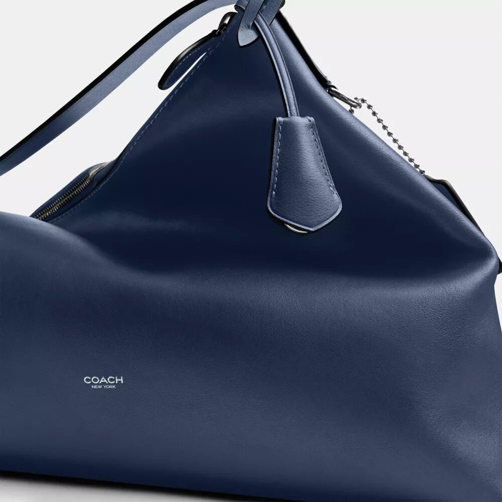 Bolso tipo mensajero Mott 38