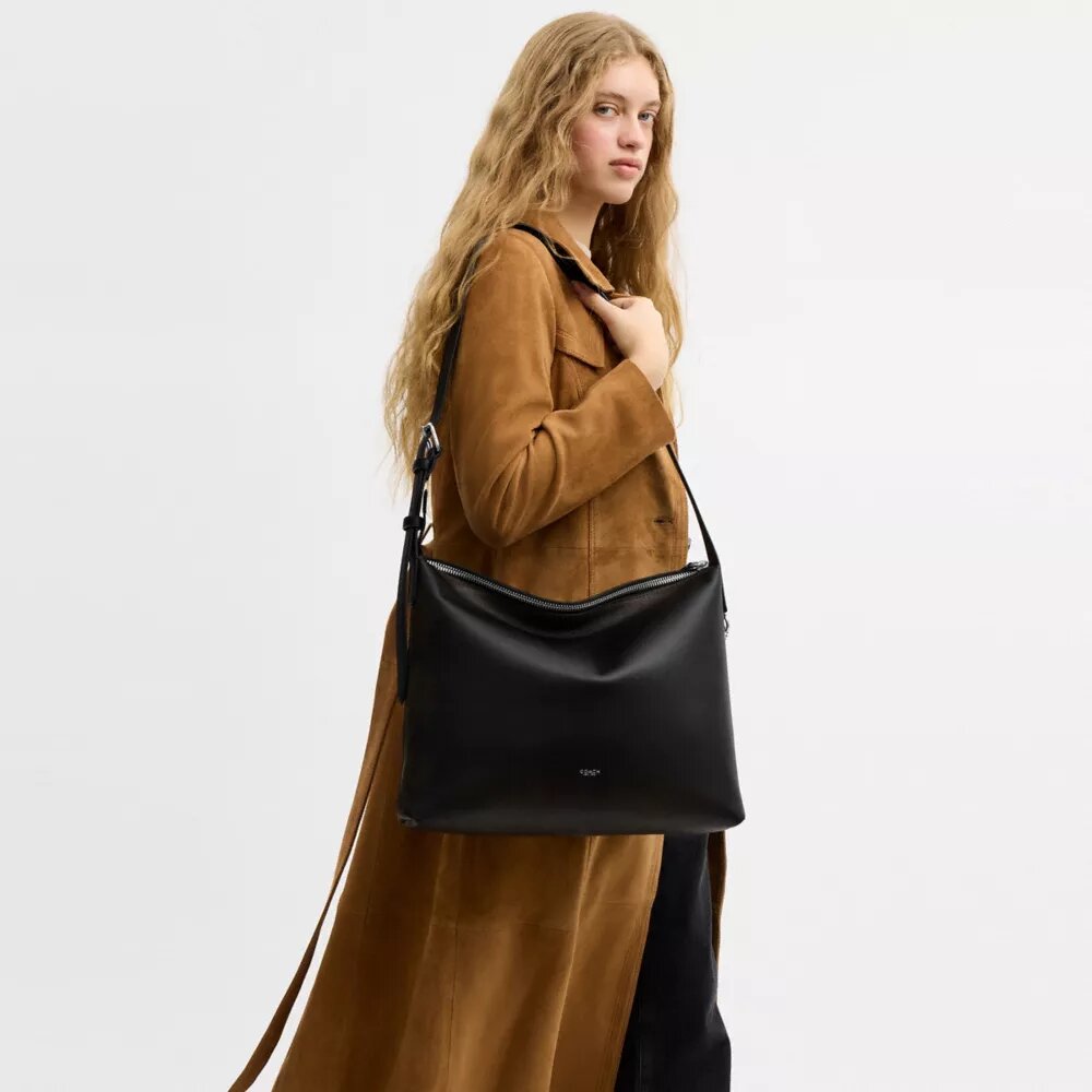 Bolso tipo mensajero Mott 38 en cuero desgastado