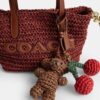 Bolso tipo tote City Mini con dijes