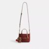 Bolso tipo tote City Mini con dijes