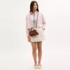 Bolso tipo tote City Mini con dijes