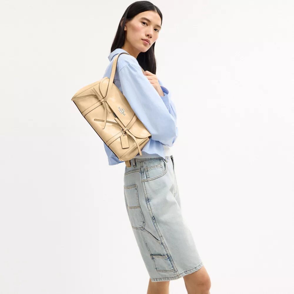 Bolsos de hombro con solapa y moños «Bridget»