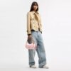 Bolsos de hombro Emily en Signature Canvas con Charms