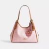Bolsos de hombro Erin en Signature Canvas con Charms