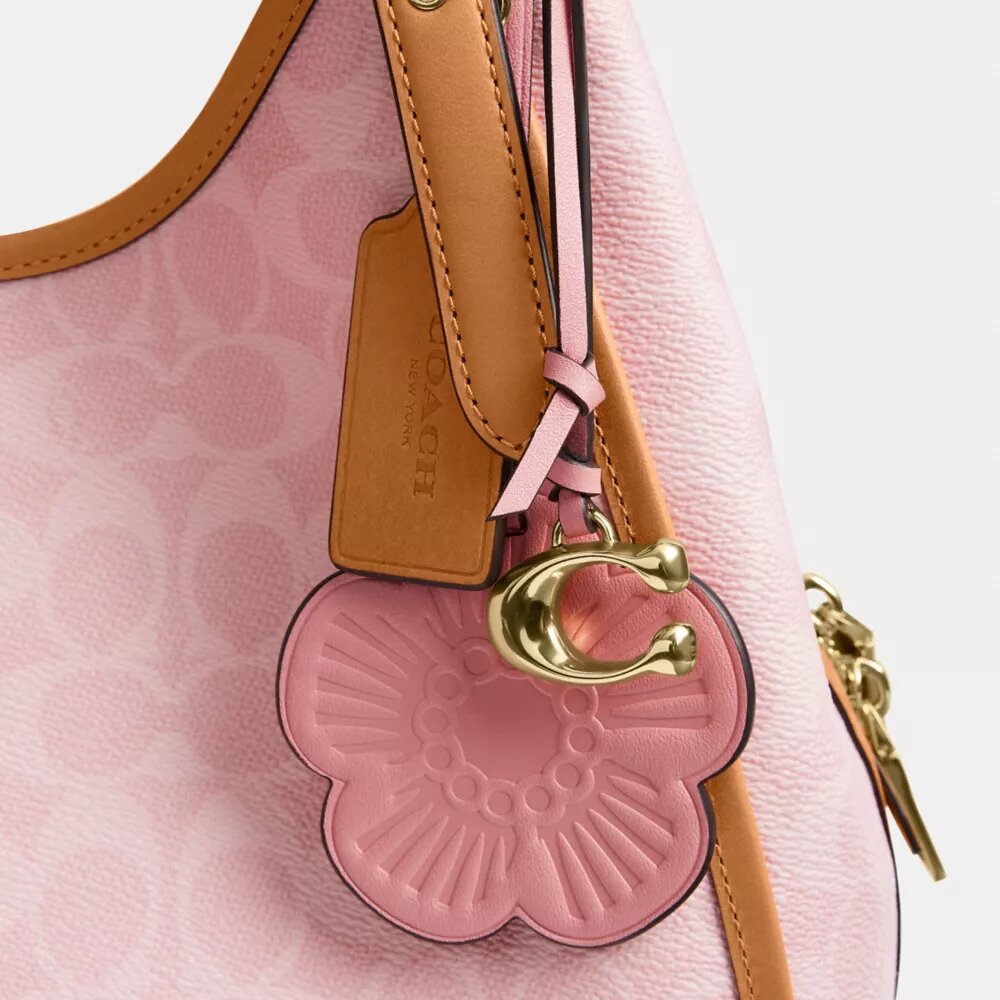 Bolsos de hombro Erin en Signature Canvas con Charms