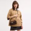 Bolsos de hombro Jet en Signature Canvas