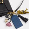 Bolsos de hombro Tabby «10.º cumpleaños de Rexy» 26 con Charms