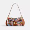 Bolsos de hombro Tabby 26 con aplique floral