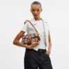 Bolsos de hombro Tabby 26 con aplique floral