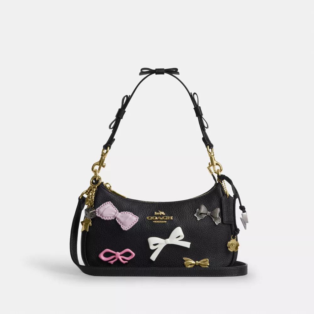 Bolsos de hombro Teri con moños y Charms