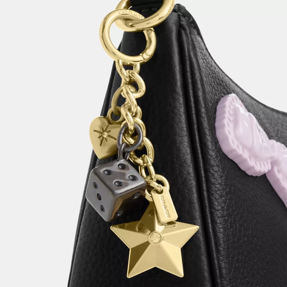 Bolsos de hombro Teri con moños y Charms