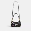Bolsos de hombro Teri con moños y Charms