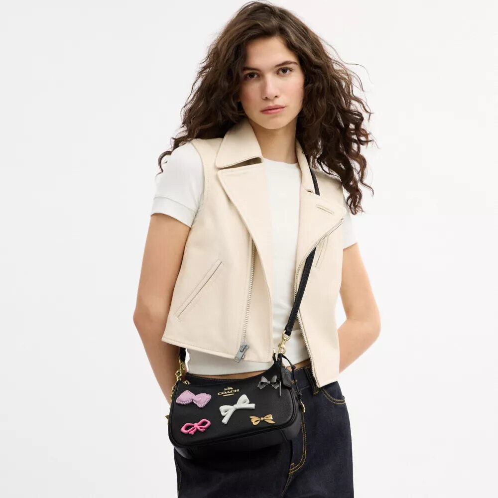 Bolsos de hombro Teri con moños y Charms