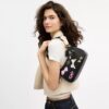 Bolsos de hombro Teri con moños y Charms