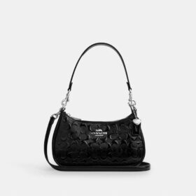 Bolsos de hombro Teri en cuero exclusivo con dije de corazón
