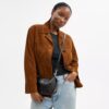 Bolsos de hombro Teri en cuero exclusivo con dije de corazón