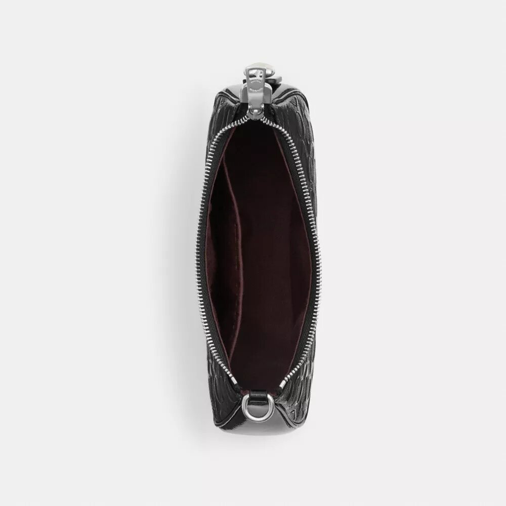 Bolsos de hombro Teri en cuero exclusivo con dije de corazón