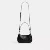 Bolsos de hombro Teri en cuero exclusivo con dije de corazón