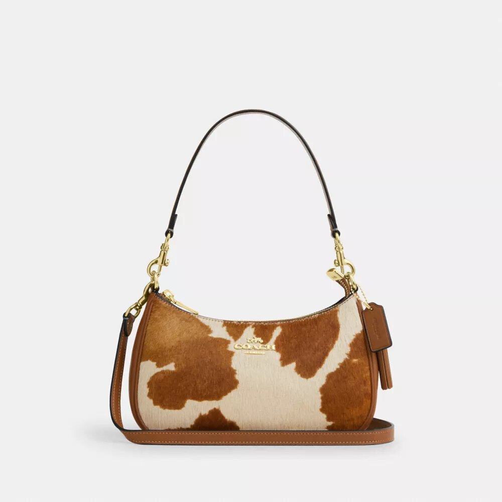 Bolsos de hombro Teri en piel de becerro con estampado de vaca