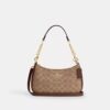Bolsos de hombro Teri en Signature Canvas