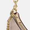 Bolsos de hombro Teri en Signature Canvas
