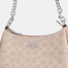 Bolsos de hombro Teri en Signature Canvas