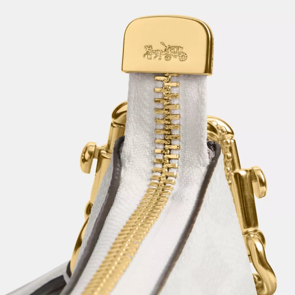 Bolsos de hombro Teri en Signature Canvas