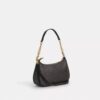 Bolsos de hombro Teri en Signature Canvas