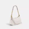 Bolsos de hombro Teri en Signature Canvas
