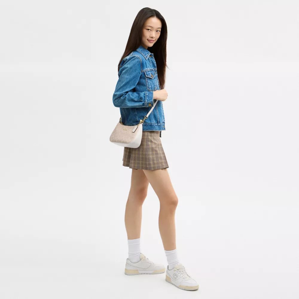 Bolsos de hombro Teri en Signature Canvas