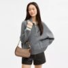 Bolsos de hombro Teri en Signature Canvas