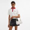 Bolsos de hombro Teri en Signature Canvas