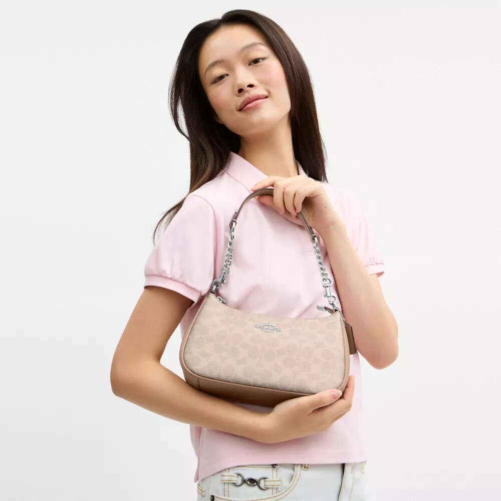 Bolsos de hombro Teri en Signature Canvas