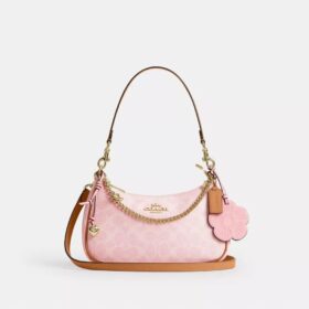 Bolsos de hombro Teri en Signature Canvas con Charms