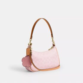 Bolsos de hombro Teri en Signature Canvas con Charms