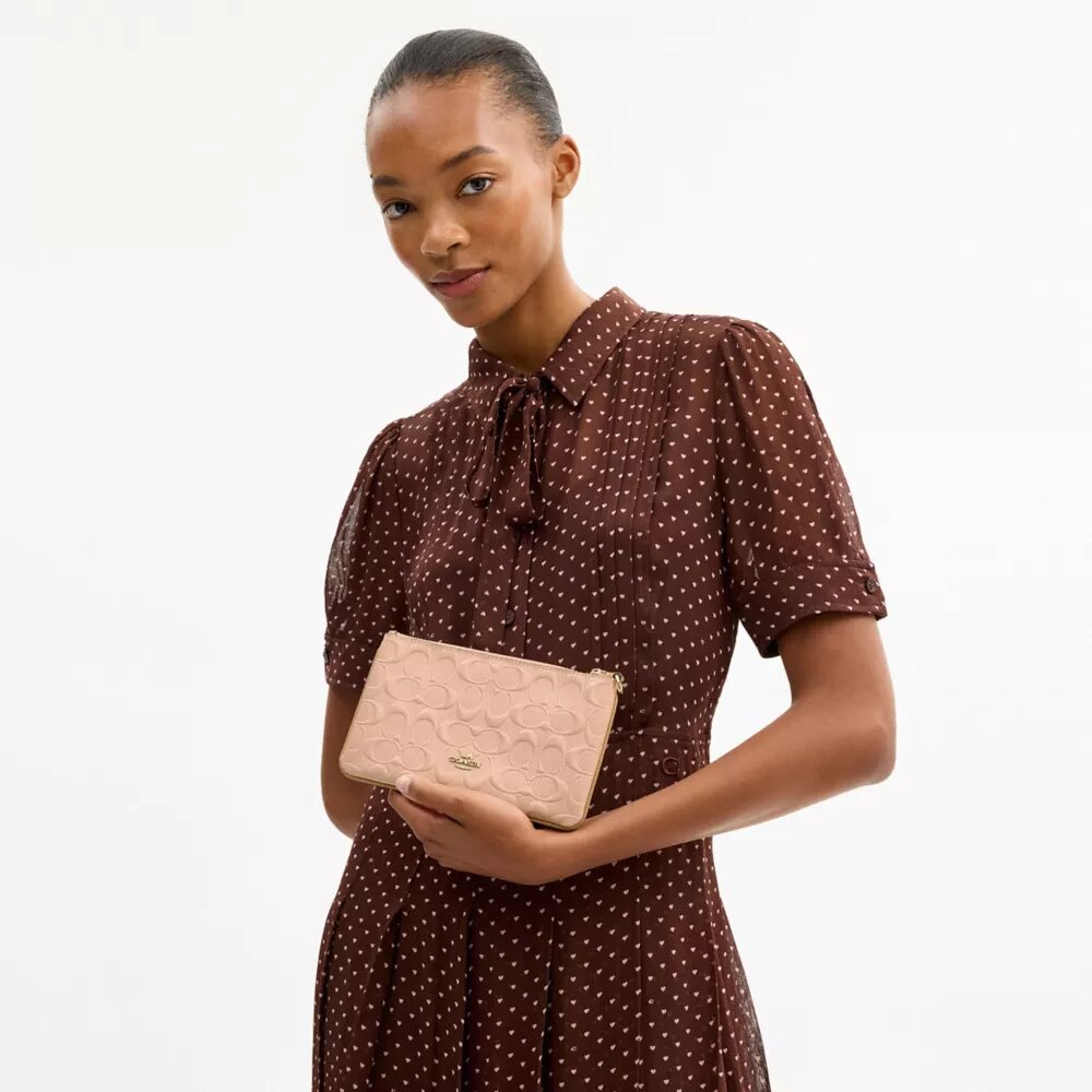Bolsos de pulsera Ashton en cuero exclusivo
