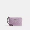 Bolsos de pulsera con cremallera en la esquina, en cuero exclusivo con Charms de corazón
