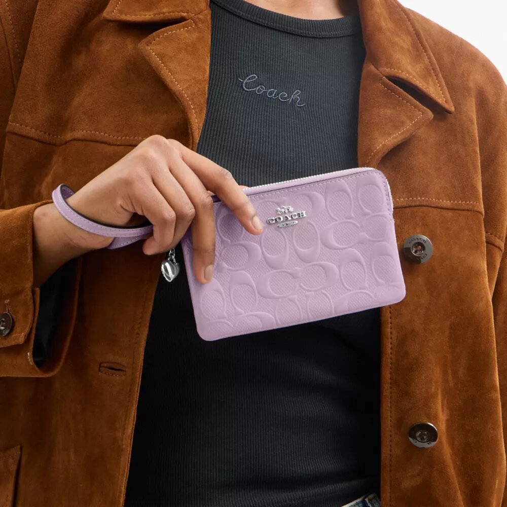 Bolsos de pulsera con cremallera en la esquina, en cuero exclusivo con Charms de corazón