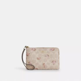 Bolsos de pulsera con cremallera en la esquina, en Signature Canvas con estampado floral