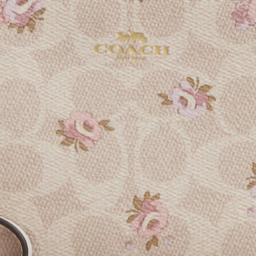 Bolsos de pulsera con cremallera en la esquina, en Signature Canvas con estampado floral